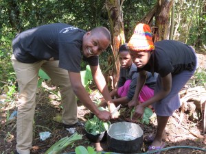 John Teaching Musa's Family How to Make a Tasty and Nutritious Meal