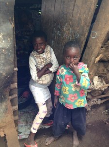 Doris (left) and friend in front of old house