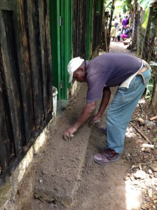 Charles smoothing out stairs. 