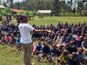 Social Worker John blowing bubbles for kids.