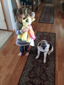 Our oldest niece, Mckenna (age 4 and a half) and RIley the pug. 