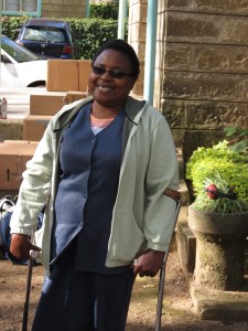 Zippy standing with crutches.