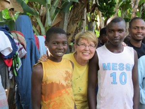 Sue with Musa (left) and his older brother (right). We met the older brother on Thursday at the celebration.